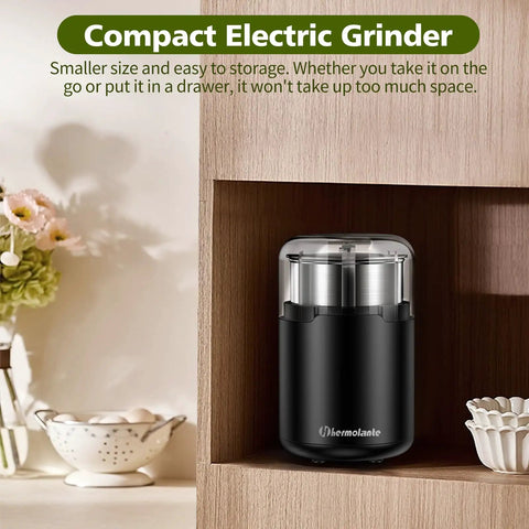 Electric Herb Grinder With Press Down Lid Fast Even Grinding Powerful Motor For Spices And Herbs Compact Kitchen Appliance in a kitchen cabinet