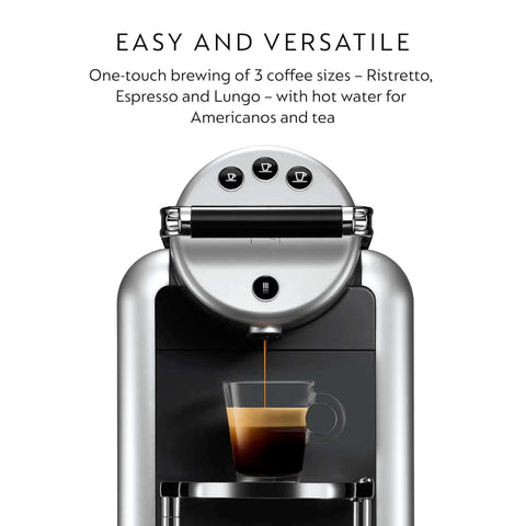 Front view of Zenius Professional Coffee Machine brewing espresso, featuring three cup size buttons on the top.
