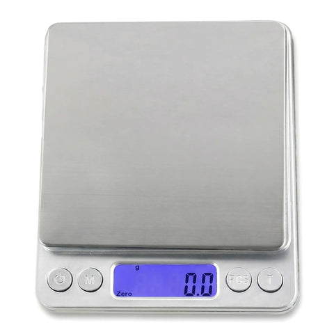 Top view of Kitchen Scale 3000G 0.1G Digital Food Scale With LCD Tare Function, silver finish and LCD display showing 0.0