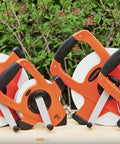 Collection of NRS18M330 Nylon Reinforced Tape Measures with Beast Speed Rewind on a wooden surface, orange cases visible