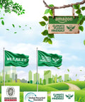 Green flags with 'Climate Pledge Friendly' logo, trees, and skyline background for eco-friendly certification advertisement.