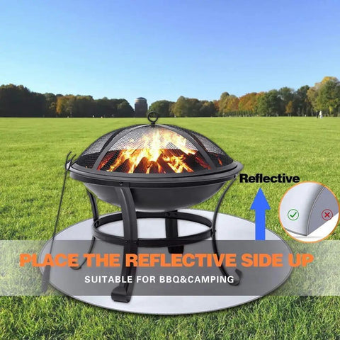 Round Fire Pit Mat for Deck and Patio below flaming fire pit on grass, featuring heat reflective 3 layer grill pad, 36 inch protector.