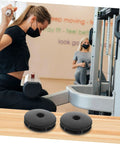 Smooth Rotation Pulley Wheel Covers For Gym Equipment, Noise Reduction Replacement Caps For Fitness Machines, Universal Fitness Pulley Covers, 2 Pairs, Durable Shield For Home Workout Gear black pulley covers on wood surface