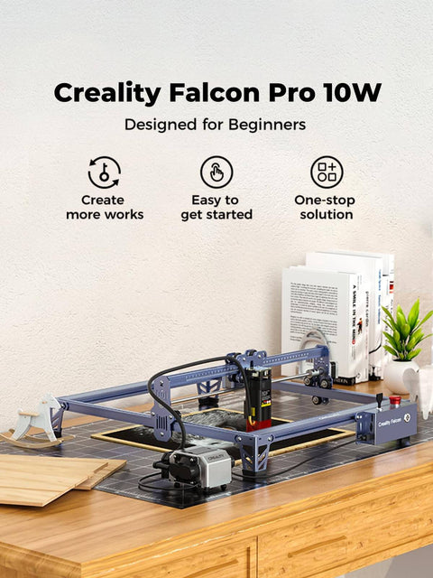 10W Pro Laser Engraver With Air Assist on wooden table, showing Falcon Pro 10W CNC laser engraving machine for wood, metal.