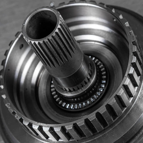 Two Pack NTA3244 2TRA Thrust Needle Roller Bearings With Washers, steel gears and bearings close-up for mechanical applications