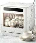 Heavy Duty Countertop Dishwasher Boasting 360 Degree Spin Spray with dishes, cups, and glasses inside, ready for cleaning.