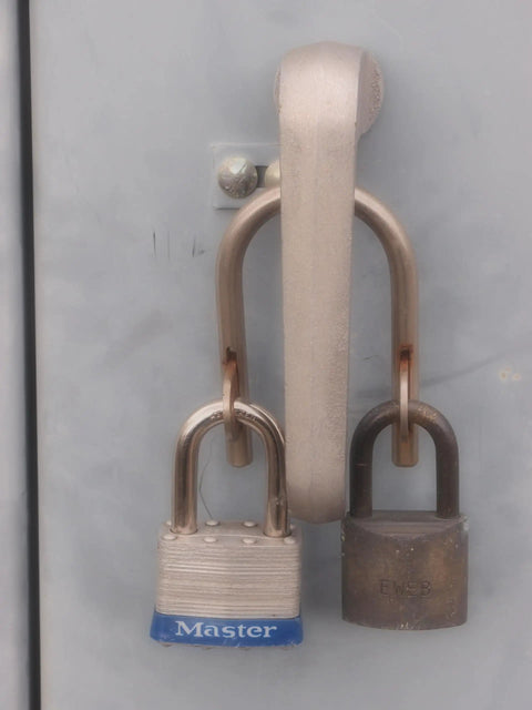Super Secure Dual Padlock Gate Lock Killing Messy Daisy Chains For Hella Tough Barn Yard Protection Letting Two Different Property Owners Use Their Own Separate Keys on a dual padlock hasp.