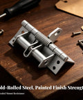 Automatic Concealed Self Closing Door Hinge With Heavy Duty Spring For Solid Wood Entryways on a wooden surface with screws.