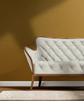 Certified Brown Floral Wallpaper With Glittering Gold Metallic Texture For Major Room Glow Ups And Slick Decor Vibes featuring a cream tufted couch.