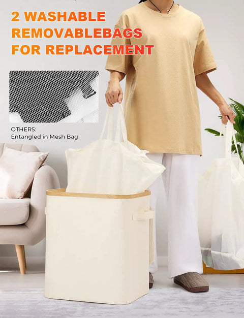 Person holding removable laundry bags with 60L Collapsible Laundry Basket With Lid, Waterproof Oxford Fabric Tote With Bamboo Frame