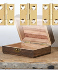 Eight Piece One Inch Brass Hinges Set With Thirty Eight Gold Screws For Jewelry Boxes Small Cabinets Drawers And Folding Cabinets Durable Solid Brass Butt Hinges 25x20mm showcasing brass hinges and an open jewelry box.