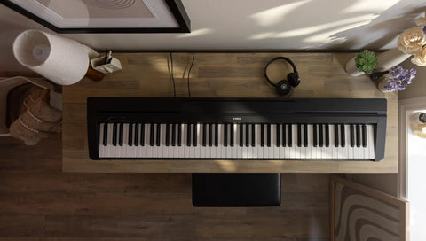Top view of 88 Key Weighted Action Digital Piano With Sustain Pedal And Power Supply, Acoustic Feel Keyboard on wooden desk