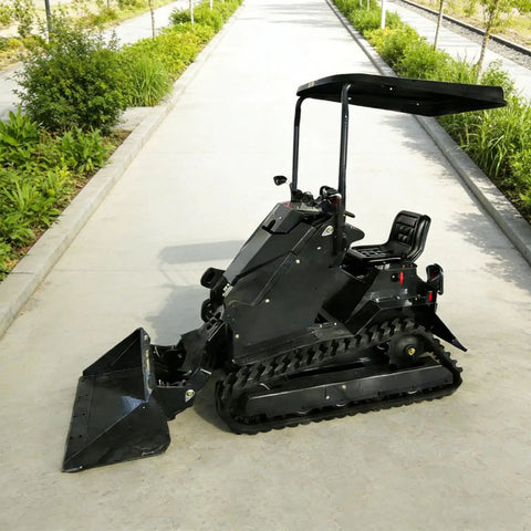 Versatile Mini Crawler Skid Steer Loader With Hydraulic Cylinder on a pathway, showcasing compact build and wear-resistant bucket.