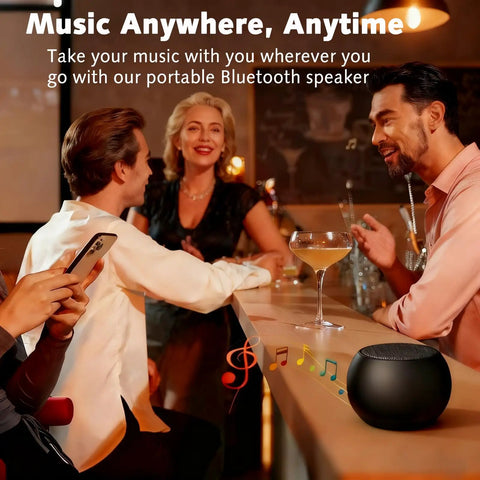 Group of people enjoying music at a bar with a pocket-sized Bluetooth speaker on a counter, showing 5W stereo sound, IP7 waterproof