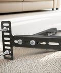 Built Tough Adjustable Headboard Brackets 2 Pack Expandable Steel Bed Frame Hardware Kit with mounting screws on carpet.