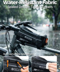 Ridiculously Handy 2L Bike Front Frame Bag with water-resistant fabric mounted on a bike, highlighting sealed zippers in rain.