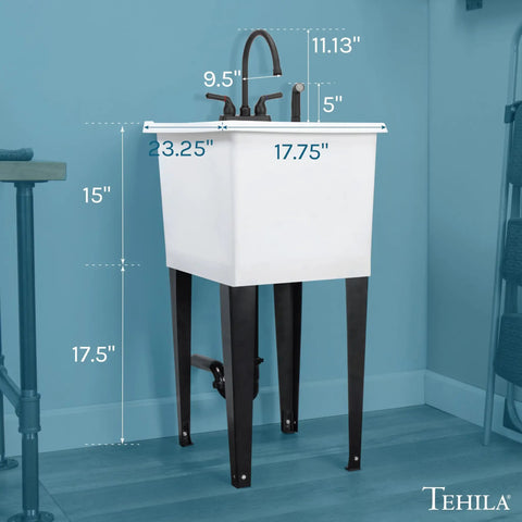 Space Saving Utility Sink With Gooseneck Faucet And Side Sprayer Narrow White Tub Black Faucet in corner of laundry area
