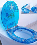 Super Slick Low Drama Auto Closing Toilet Seat With Silent Drop Lid And Transparent Fish Motif Universal Fit For Oval Round Or Square Bowls Heavy Duty Resin For Your Clean Bathroom Glow Up, blue fish design.