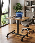 Rock Solid Mobile Standing Desk With Smooth Rollers And Quick Rise Adjustments For Effortless Sit Stand Transitions In Your Home Office Or Man Cave Featuring Classic Rustic Timber Top And Versatile Computer Workstation with laptop and chair.