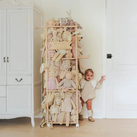 Vertical Plush Toy Organizer From Solid Pine Wood Space Saving Stuffed Animal Storage with toys and child nearby
