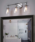 Three Light Industrial Wall Sconce With On Off Switch And Clear Glass Shade For A Cool Retro Vibe Vintage Antique Brass Vanity Lighting For Bathroom And Living Room Dimmable When Paired With A Compatible Dimmer Bell Shade Finish.