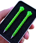 Forever Tee Premium Metal Unbreakable Golf Tees 2 Pack with Extended Metal Tip, bright green transparent plastic, displayed in hand