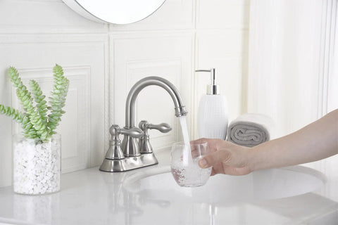 Person using Two Handles Brushed Nickel Bathroom Faucet With Overflow Pop Up Drain For 3 Hole Sinks, 360 Degree Swivel Spout