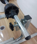 Close-up of Heavy Duty All Metal Roll Holder Dispenser for Bubble Wrap Stretch Film Foam showing steel frame and adjustable components.