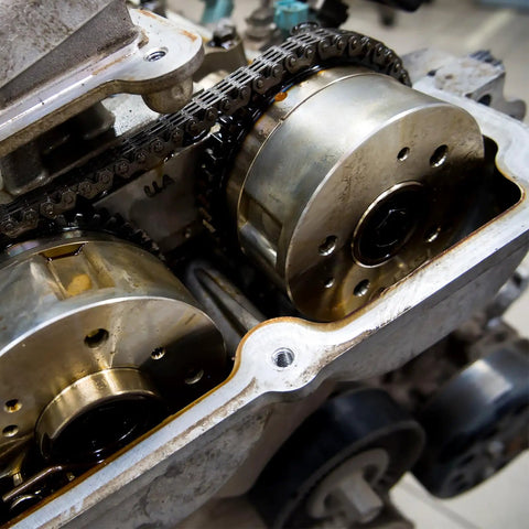 Beefy Heavy Duty Shaft Collar With 3/4 Inch Bore, 1-1/4 Inch OD, 9/16 Inch Width, 304 Stainless Steel Set Screw Ring For Wheelbarrow Axles, Gearboxes, And Machine Tools, Durable Spacer And Positioning Collar. Installed on a metal shaft with chain drive.