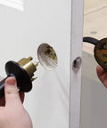 Door Lock Installation Kit With Jig For Wood And Metal Doors Fits Standard Doors From One And Three Eighths Inches To One And Three Quarters Inches Thick Includes Bi Metal Cobalt Hole Saws And Step Drill Guide For Precise Easy Lock Installation No Fuss being used on a door.