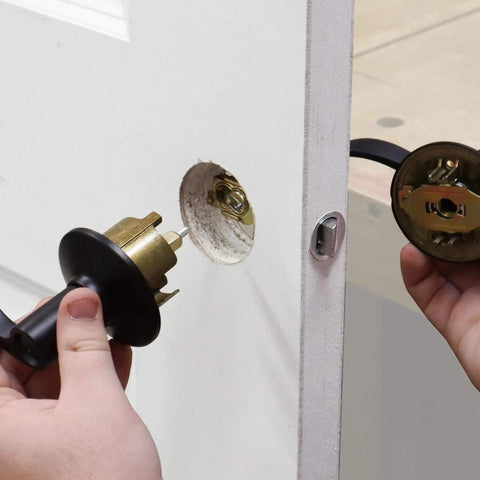 Door Lock Installation Kit With Jig For Wood And Metal Doors Fits Standard Doors From One And Three Eighths Inches To One And Three Quarters Inches Thick Includes Bi Metal Cobalt Hole Saws And Step Drill Guide For Precise Easy Lock Installation No Fuss being used on a door.