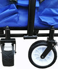 Close-up of heavy duty foldable trolley wheel for camping and garden transport, showing push pull rod and adjustable handle.