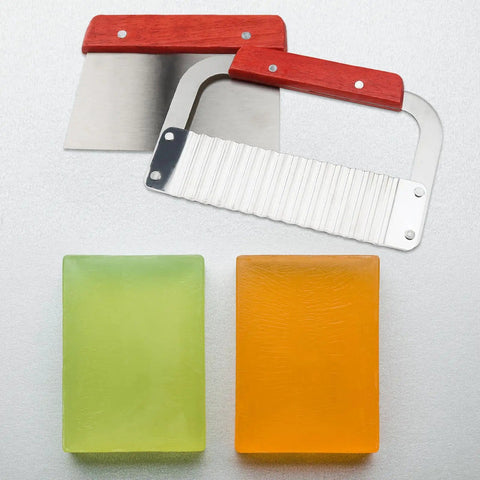 Ultimate 7 Piece Soap Making Kit With Silicone Molds And Stainless Steel Slicers, shown with wavy and straight slicers