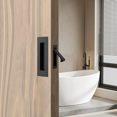 Side view of pocket door with matte black flush handles, showing modern design for sliding doors, includes two 6x2 inch pulls, 3.15x0.87 inch edge pull.