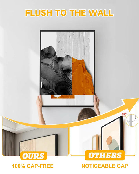 Person hanging art frame flush on wall with 40 Pack Picture Hangers Super Hooks For Drywall No Tools Needed Holds Up To 100 Lbs Silver Finish Heavy Duty Design For Art Frames Canvases Mirrors Clocks Or Planters In Living Room Bedroom Kitchen Decor.