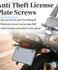 Badass Spiked License Plate Screws Four Pack Anti Theft Security Bolts For Cars And Motorcycles Silver Chrome Finish displayed on motorcycle.