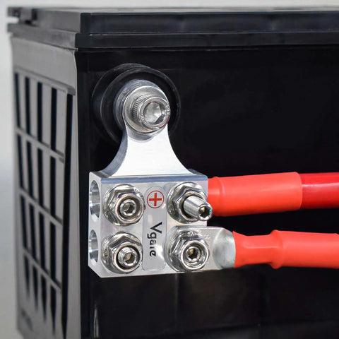 Eight Way Battery Terminal Distribution Block For Lithium Or Agm Batteries Featuring Four Awg Hole Holders Plus Threaded Studs on battery.