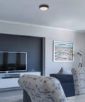 Living room with Two Light Indoor Flush Mount Ceiling Fixture in Oil Rubbed Bronze with Frosted Glass and Highlight Detailing Classic Vibe Style 13 Inch Ceiling Light For Living Rooms And Hallways, illuminating the space.