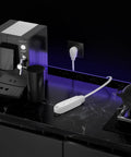 3-Outlet Flat Extension Cord 30 Ft With 16 Gauge Cable, Flat Plug And Angled 3 Prong on a kitchen countertop