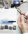 All In One Glasses Repair Kit Set With Assorted Screws Nose Pads Mini Screwdrivers And Accessories For Quick On The Go Eyewear Fixes At Home Or Travel Anywhere shown in use with glasses.
