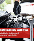 Person using a combination wrench to tighten nuts in car engine compartment.