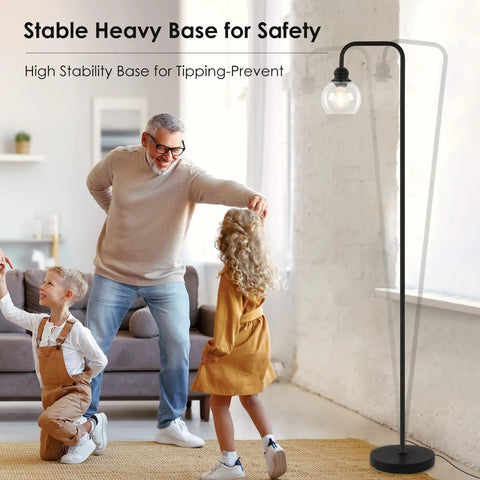 Cool Industrial Glass Globe LED Floor Lamp 63 Inch Tall Black Standing Reading Light in cozy living room scene