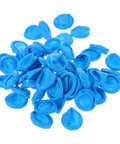 100 Pack Blue Nitrile Antistatic Finger Sleeves scattered, showcasing the soft fit and durable material for cleanroom tasks.
