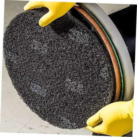 Close-up of Five Pack 17 Inch Black Microfiber Floor Cleaning Pads for Polishing Scrubbing and Wax Removal being installed