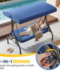 Woman reclining on Three Seat Outdoor Porch Swing With Adjustable Canopy Converts To Bed Two In One Patio Swing Blue