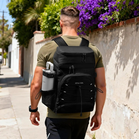 Man wearing Leakproof Insulated Backpack Cooler For 33 Cans Soft Cooler Bag With Lightweight Comfort Perfect For Camping Beach Tailgate Lunch And Day Trips 23L Black