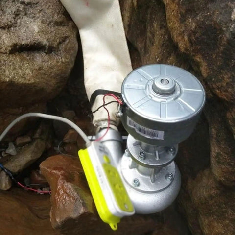 Water Turbine Generator 400W Hydroelectric Power Unit 220V Micro Hydro Generator installed in rocky creek setting