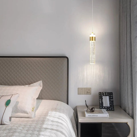 Gold Crystal Pendant Light For Kitchen Island, 4000K LED Modern Adjustable Chandelier hanging beside a bed, stylish bedroom decor