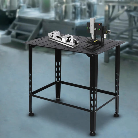Built Like A Tank Heavy Duty Welding Table 36 By 24 Inches with tools on surface, ideal for metalwork and projects.
