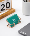 Metal Desk Card Holder For Office And Home, Large Capacity Card Organizer With Durable Gold Finish on desk with laptop